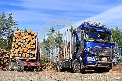 Sisu Logging Truck and Trailer Full of Wood