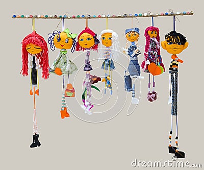 Six female and one male handmade isolated thin dolls toys in fas