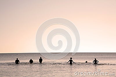 Six people in water