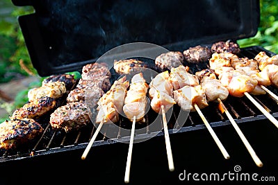 Sizzling burgers and chicken kebabs