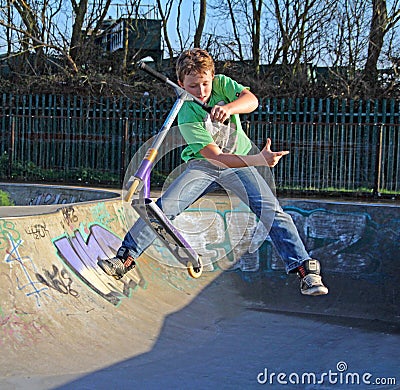 Skate park scooter boy