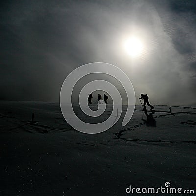 Ski hiking in swiss alps in sun