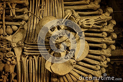 Skulls and bones. Kutna Hora, Czech Republic. textured old paper