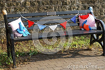 Slatted Black Bench Womens Institute Yarn Bombing