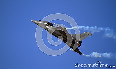 Sleek fighter zooming up into the sky