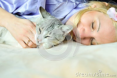Sleeping woman and cat