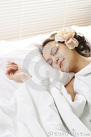 Sleeping Woman in the morning in bed