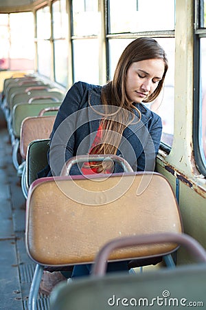 Sleepy woman resting in bus