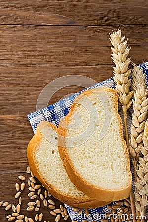 Sliced bread and ears of wheat
