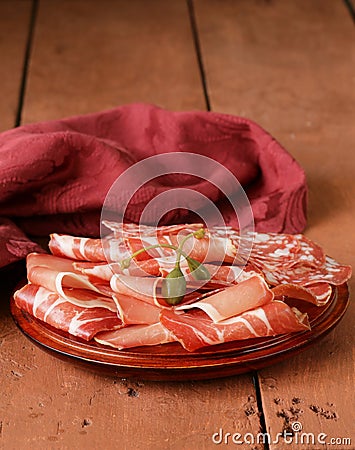 Sliced dried sausage meat (ham, prosciutto, salami)