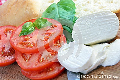 Sliced Tomatoes, Bread and Fresh Mozzarella Cheese