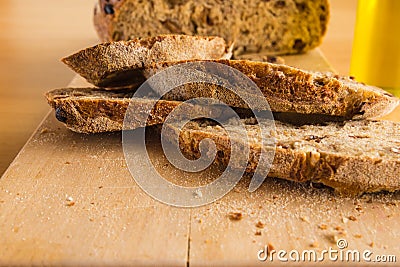 Slides of Handmade Bread on a Wood Table