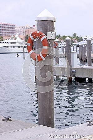 Luxury Boat slip number 12 dockside in the Bahamas with small dingy 