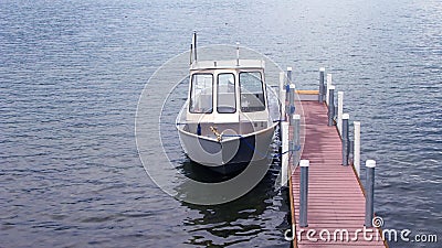 Small Boat Tied To Narrow Dock Royalty Free Stock Photo - Image 
