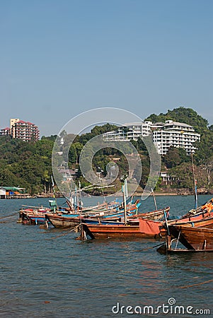 Small boats moored in ocean water