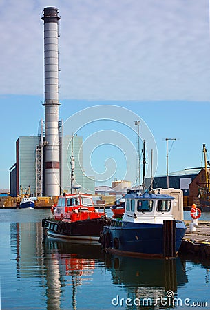 Small boats and power station in background