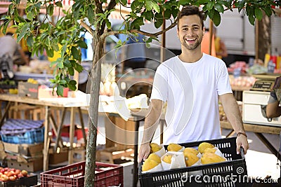 Small business owner selling organic fruits.