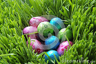 Small chocolate eggs in bright covering