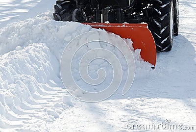 Small tractor snow removal in the park