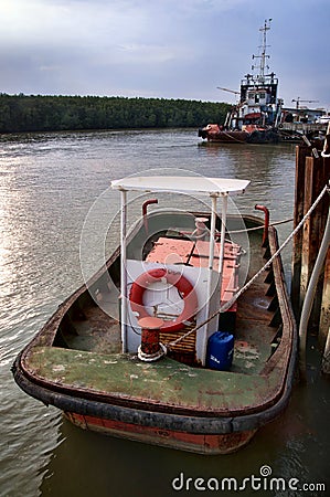 Small tug boat at ship yard
