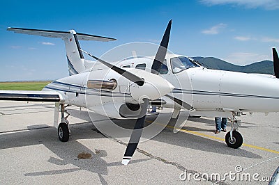 Small white passenger plane.