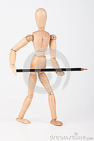 Small wood mannequin standing with colour pencil isolated on whi