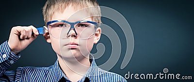 Smart boy in virtual glasses with memory card.