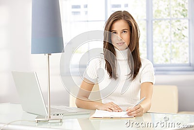 Smart woman working at home