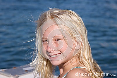 Smiling Blond Girl on Boat