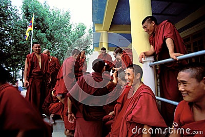 Smiling Buddhists waiting to see the Dalai Lama in India