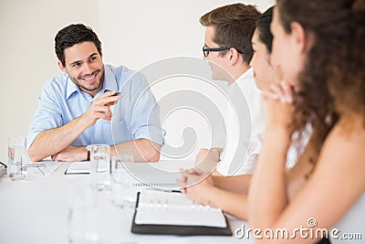Smiling businessman in meeting