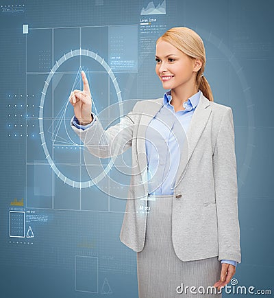 Smiling businesswoman working with virtual screen