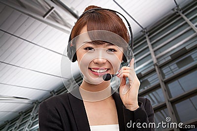 Smiling call center operator business woman