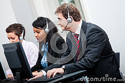 Smiling callcenter agent with headset support