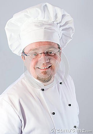 Smiling cook chef on white