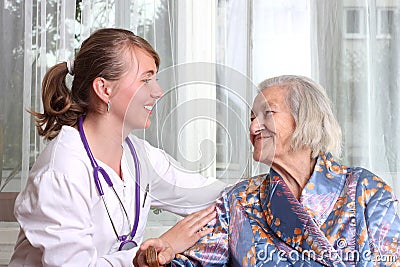 Smiling doctor takes care the senior