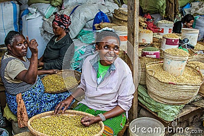 Smiling elderly women selling spices in their stall