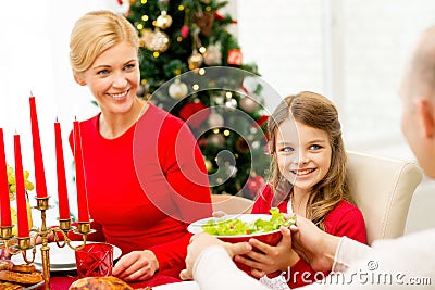 Smiling family having holiday dinner at home