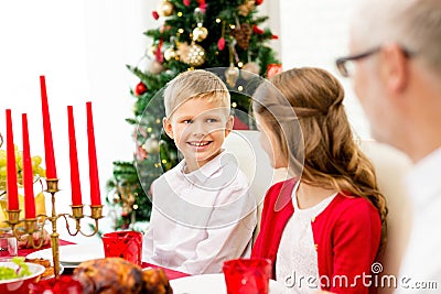 Smiling family having holiday dinner at home