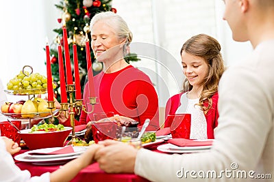 Smiling family having holiday dinner at home