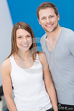 Smiling friendly fit young couple