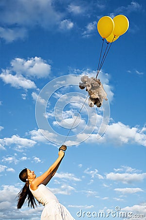 Smiling girl and her flying poodle dog