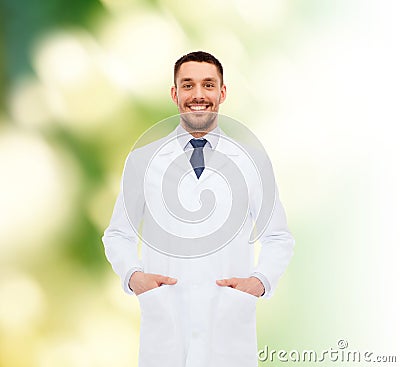 Smiling male doctor in white coat
