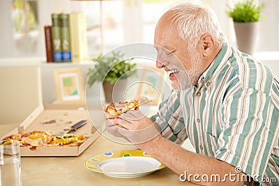 smiling-older-man-eating-pizza-slice-166