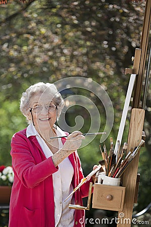 Smiling Senior Woman Painting