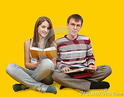 Smiling students with books