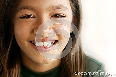 Smiling toothless young girl