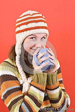 Smiling woman with cup