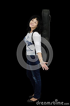 Smiling woman guitarist standing sideways