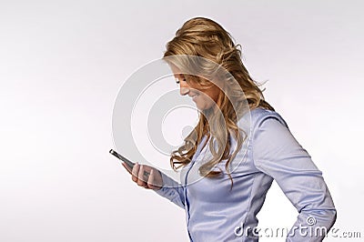 Smiling woman with smartphone